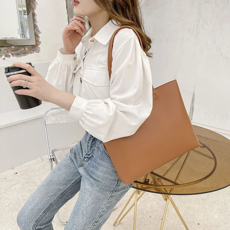 Bolso de mano femenino de estilo moderno Este bolso de hombro para mujer combina diseño elegante con funcionalidad, ideal para uso diario o eventos especiales. Su estilo fashion y forma casual tote lo hacen versátil para múltiples ocasiones.