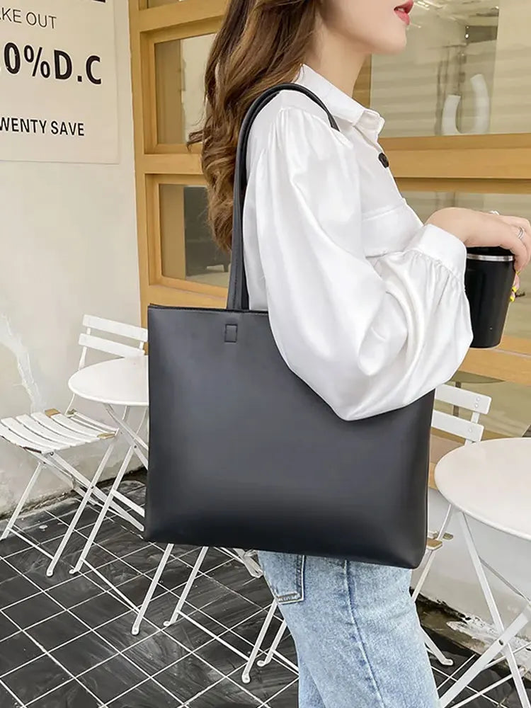 Bolso de mano femenino de estilo moderno Este bolso de hombro para mujer combina diseño elegante con funcionalidad, ideal para uso diario o eventos especiales. Su estilo fashion y forma casual tote lo hacen versátil para múltiples ocasiones.