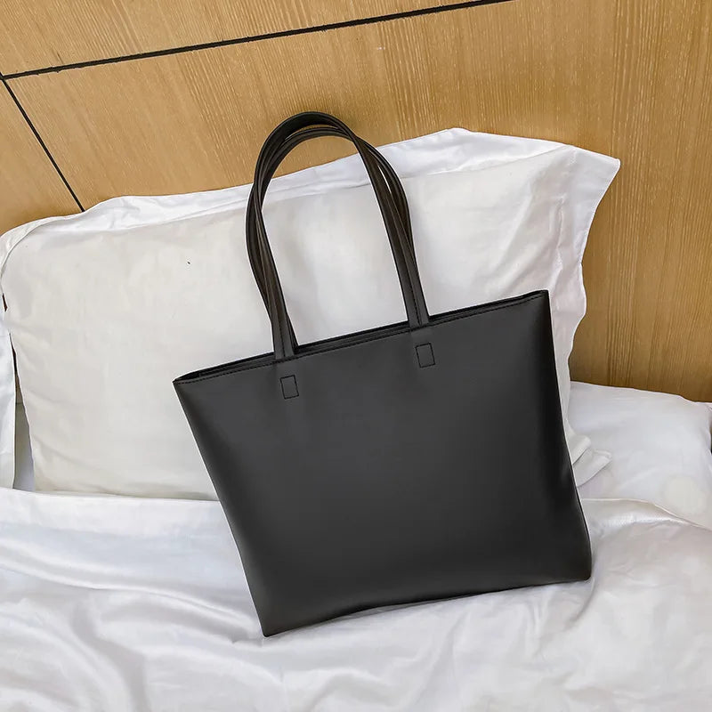 Bolso de mano femenino de estilo moderno Este bolso de hombro para mujer combina diseño elegante con funcionalidad, ideal para uso diario o eventos especiales. Su estilo fashion y forma casual tote lo hacen versátil para múltiples ocasiones.